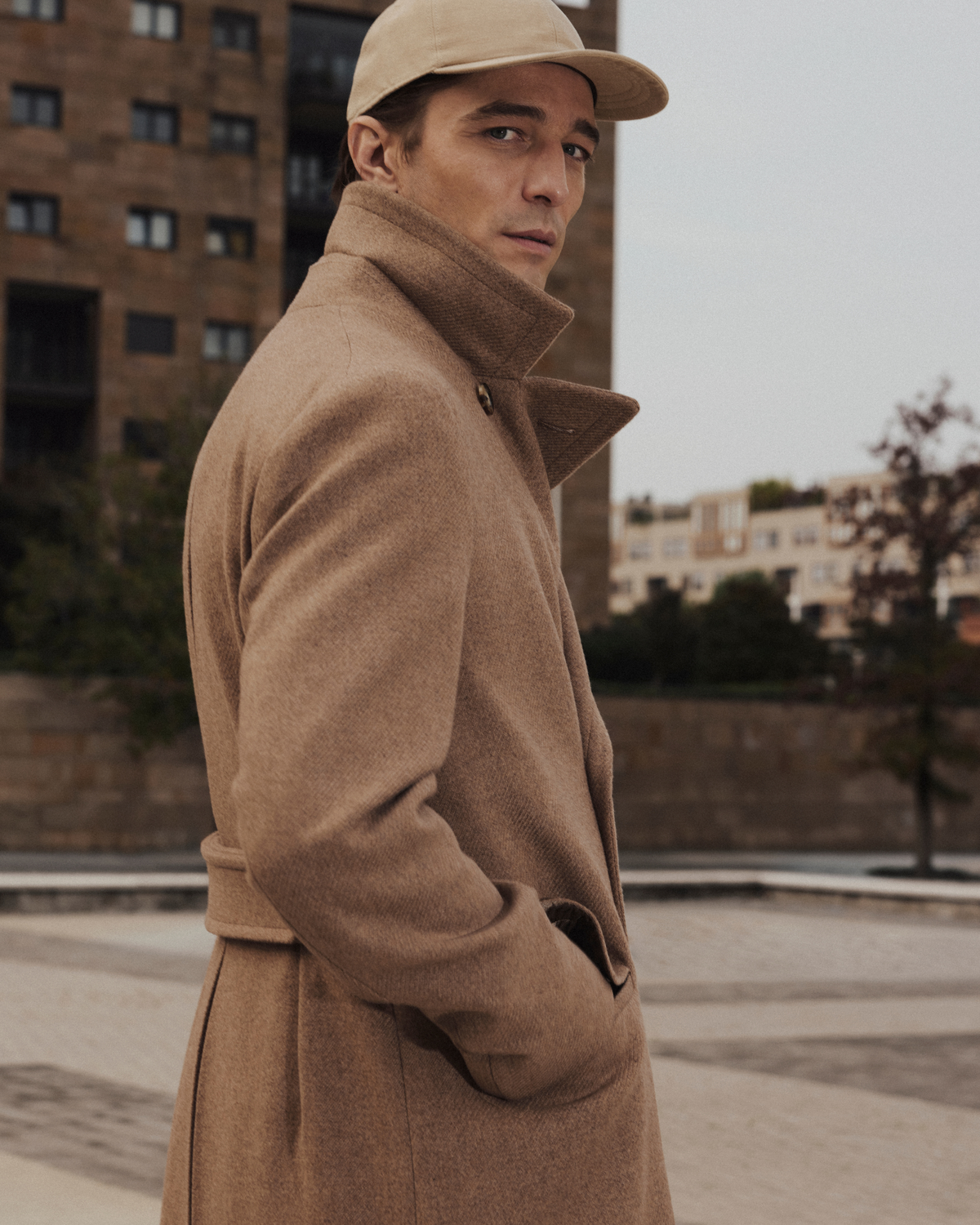 person in a green coat